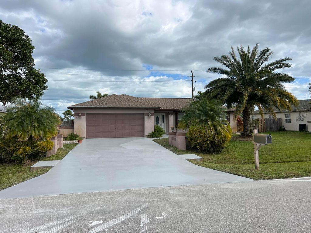 Photo of 1561 SE Appamattox Terrace, Port Saint Lucie, FL 34952 (MLS # R11163180)