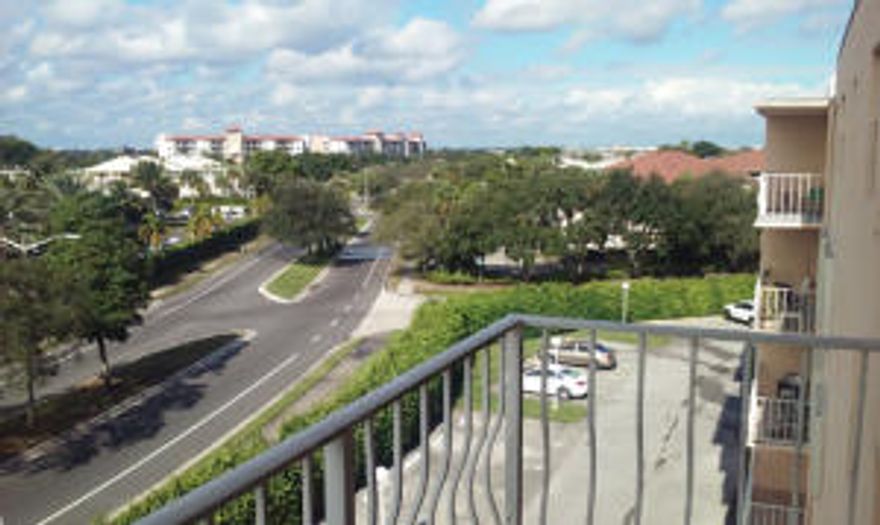 Large 1bed / 1 bath, fifth floor unit with serene City views. Full kitchen and full dining room. Super clean, tiled. Large closets with extra storage. Resort style community with tons of amenities, active clubhouse, outdoor pool, tennis, fitness, sauna. Gated community, interior A/C hallways, lobby, storage and laundry on each floor. Shows beautifully.  Water included.