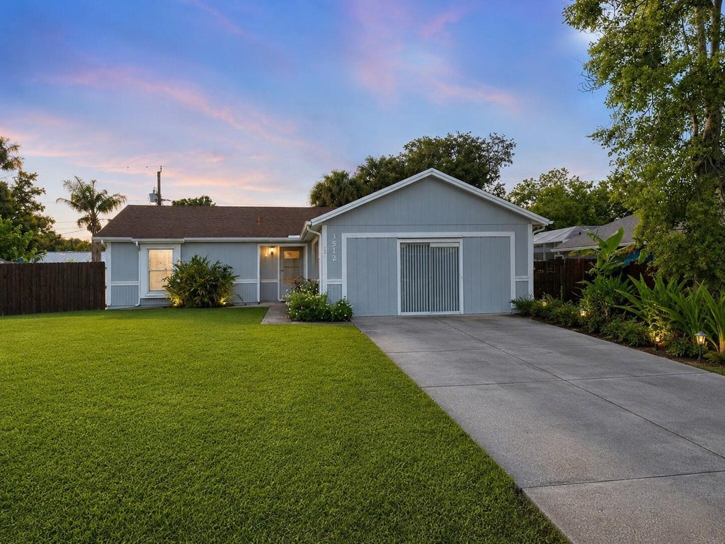 Photo of 3512 SW VOLLMER Street, Port Saint Lucie, FL 34953 (MLS # B26056904)