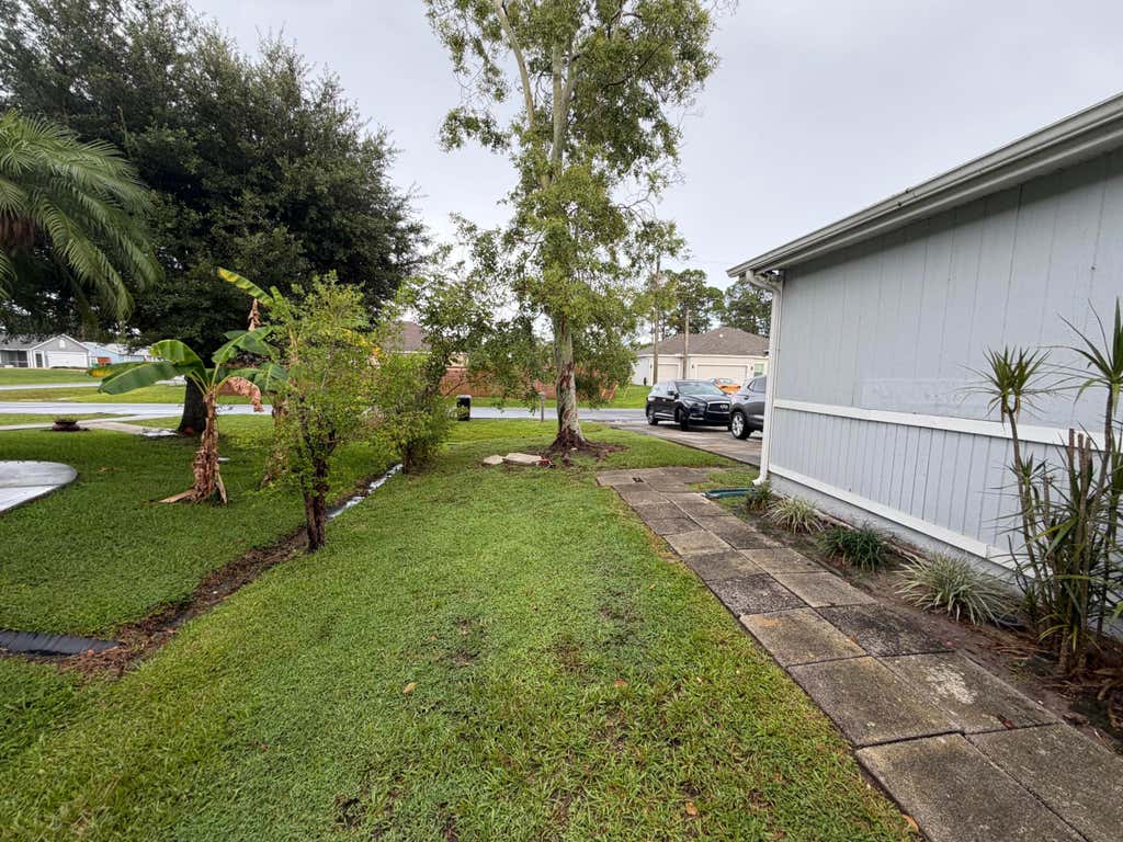 Photo of 3512 SW VOLLMER Street, Port Saint Lucie, FL 34953 (MLS # B26056904)
