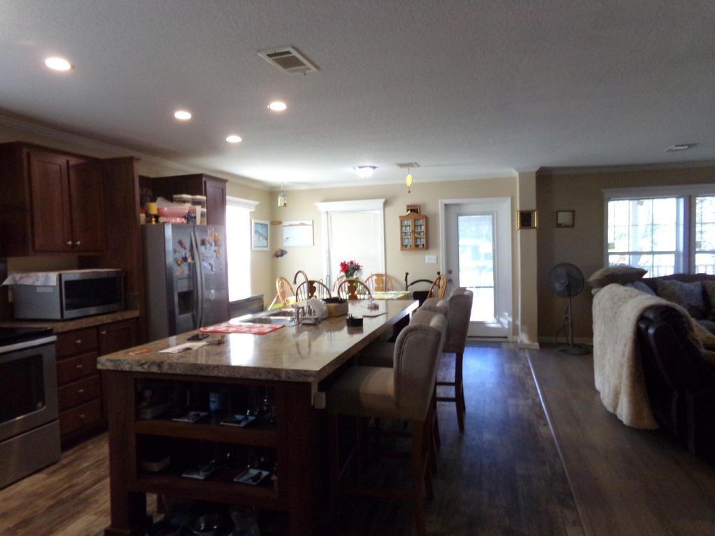 Photo of 147 Plantation Boulevard, Greenacres, FL 33467 (MLS # B26000660)