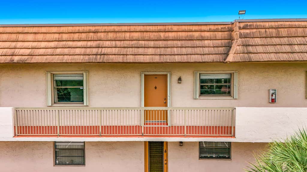 Photo of 4970 E Sabal Palm Boulevard, Tamarac, FL 33319 (MLS # B26061757)