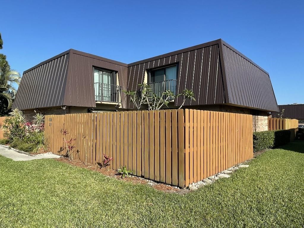 Photo of 5621 SE Windsong Ln #511, Stuart, FL 34997 (MLS # F10281970)