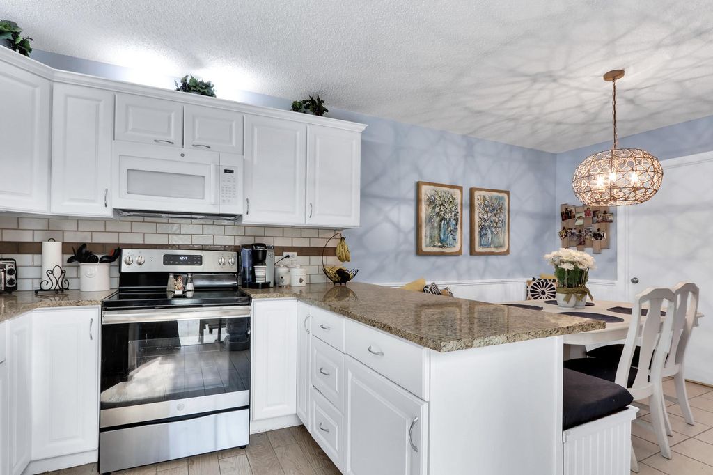 Photo of 1611 16th Lane, Palm Beach Gardens, FL 33418 (MLS # R10793976)