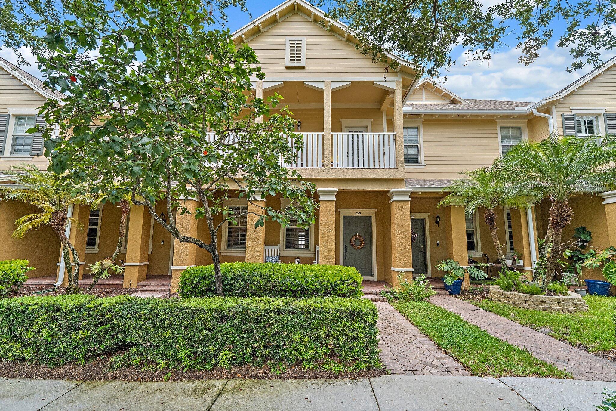 A++ location! Live in the heart of Jupiter with this 3-bedroom, 2.5-bath townhome offering serene lake views and a spacious private patio. Step inside to a bright living room + dining room combination, inviting kitchen with wood cabinetry, a large walk-in pantry, breakfast/office nook and French doors that open to the patio. Enjoy the peace of mind of a brand-new roof (2025) and newer water heater (2021). The 1-car garage adds convenience and storage, while the covered front porch and second-story balcony both overlook the tranquil lake. Washer and dryer are conveniently located upstairs. Botanica is known for its charming tree-lined streets, scenic walking trails, and lush nature preserves. Just a short stroll to Publix, Starbucks, and neighborhood shops....