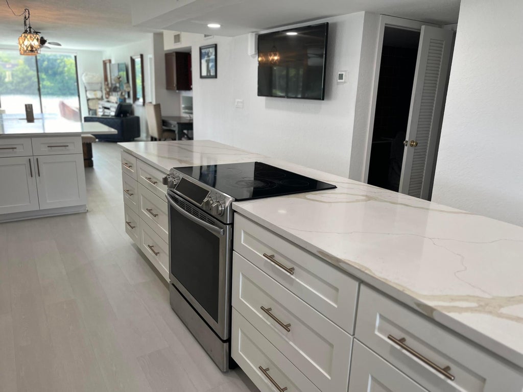 Photo of 4491 Crystal Lake Drive #108a, Deerfield Beach, FL 33064 (MLS # B26047745)