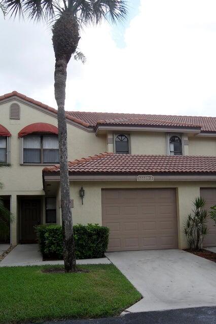 Don't miss out on this 3 bedroom, 2.5 bathroom townhome in Wellington! Granite counter tops in the kitchen with newer cabinets in the kitchen and the upstairs bathroom has been totally remodeled. Master bath has dual sinks and a large walk-in closet. All windows in the home are hurricane impact glass and newer window treatments. Covered, screened patio off living area. Neighborhood features a community pool. ''A'' rated Wellington schools! This will not last! (Sorry, no pets)