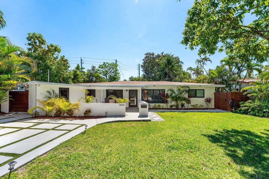 Discover your own private tropical retreat in the highly desirable Coral Ridge/Coral Shores neighborhood of East Fort Lauderdale. This fully renovated 3-bedroom, 2-bathroom residence blends modern luxury with effortless South Florida living in one of the area's most sought-after locations—just 5 minutes from the beach. Offered fully furnished and move-in ready, the home features stylish upgrades throughout, spacious indoor-outdoor living, and the flexibility of no rental restrictions, making it ideal as a primary residence, vacation home, or investment property. Enjoy being minutes from world-class dining on Las Olas, premier shopping at The Galleria Mall, and everything Fort Lauderdale's vibrant coastal lifestyle has to offer.