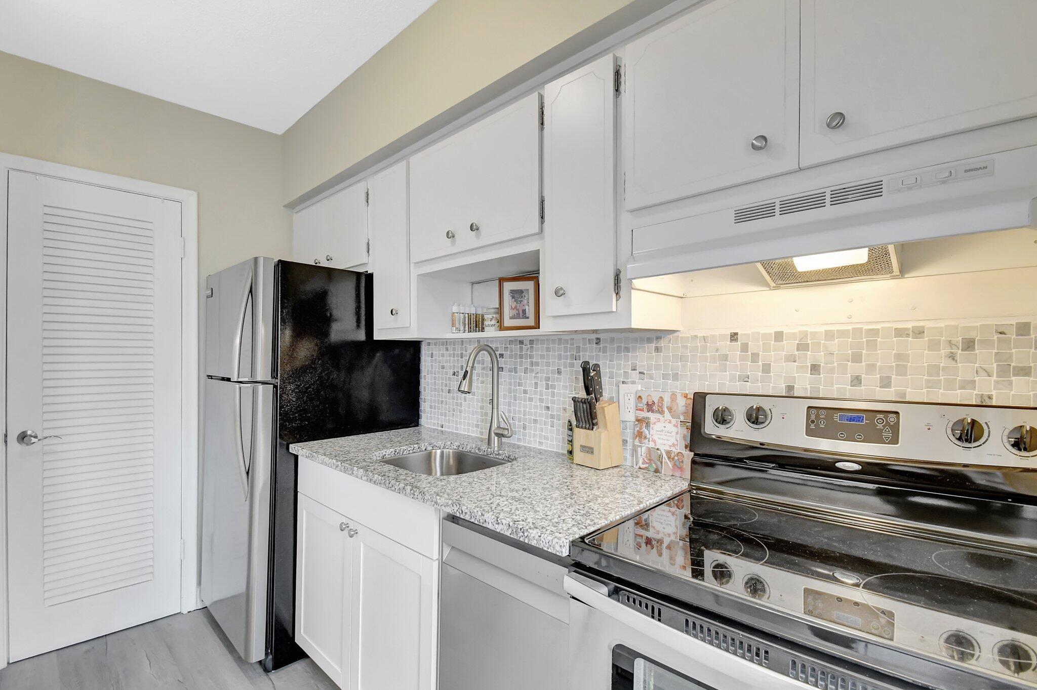 Welcome Home! Come see this beautiful first floor studio home in Lighthouse Point. Park right next to your home and enter to see an open home. The kitchen is complete with granite counter tops, stainless steel appliances and a pantry. There is a walk-in closet for you too. Enjoy peaceful mornings on the back screened in patio. The home is steps away from the common laundry area, mailboxes and extra storage area. Great community with a pool, clubhouse and shuffle board.