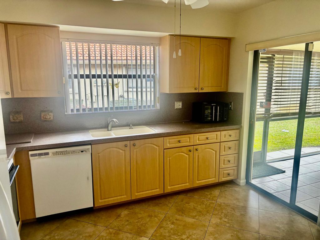 Photo of 9890 Bischofia Tree Way #B, Boynton Beach, FL 33436 (MLS # R11163657)