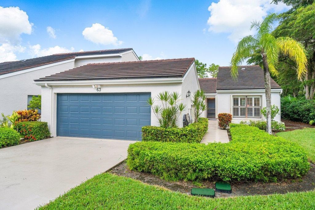 Photo of 63 Edinburgh Drive, Palm Beach Gardens, FL 33418 (MLS # R10931268)