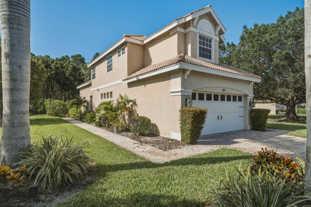 Photo of 609 SW Saint Thomas Cove, Port Saint Lucie, FL 34986 (MLS # B26051064)