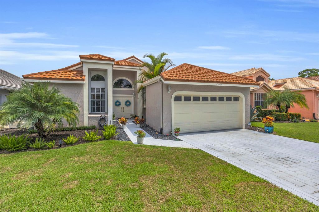 Photo of 13862 Palm Grove Place, Palm Beach Gardens, FL 33418 (MLS # R11122471)