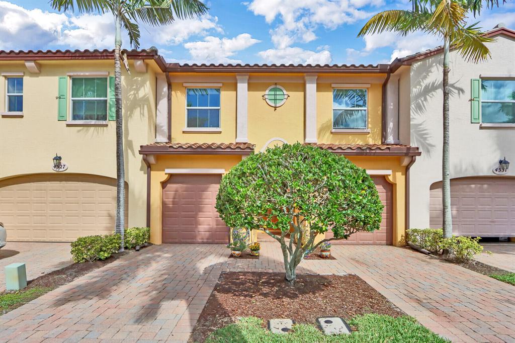 Location, Location, Location! Trevi is the place for you. The community offers an incredible value for its amenities, quality of construction, and upgrades. It has 3 bedrooms, 2 1/2 baths and 2 separate car garages. Having an upgraded kitchen with high quality cabinetry, granite, stainless appliances, and built in desk this home is great for entertaining. Brand new floors throughout along with crown moldings throughout and impact glass to feel safe. Underground electric supply to worry less about storms. Association Fee includes basic cable, high speed internet, and building insurance. It has a large main bedroom bathroom with a large walk-in customized main closet that is perfect for those needing some space. The laundry room is upstairs for your convenience. This home offers so much.