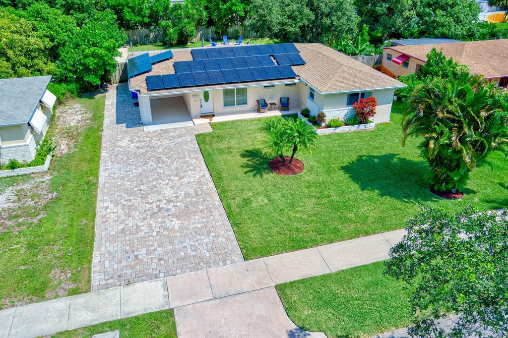 Photo of 445 Flagler Boulevard, Lake Park, FL 33403 (MLS # R10900958)