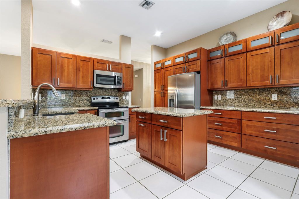 Photo of 5320 NW 57th Terrace, Coral Springs, FL 33067 (MLS # F10459339)