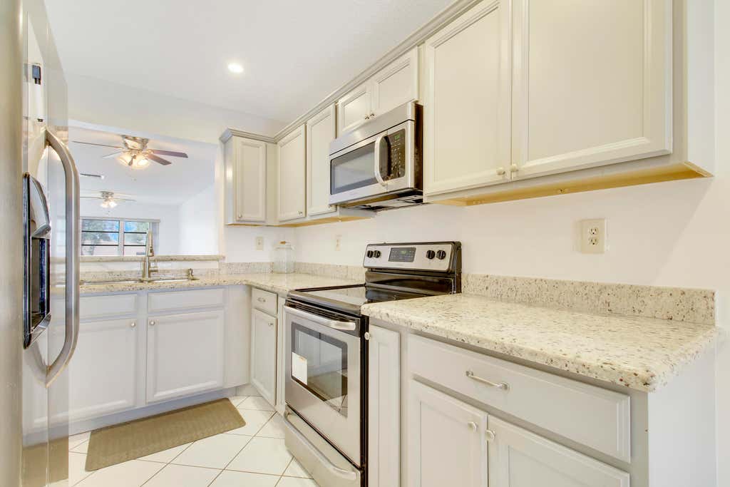 Photo of 5710 Princess Palm Court #F, Delray Beach, FL 33484 (MLS # R10956589)