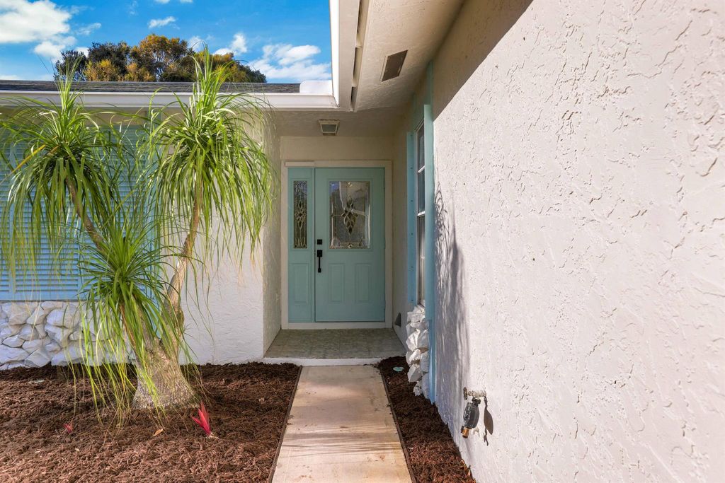 Photo of 6309 SE Poinciana Lane, Hobe Sound, FL 33455 (MLS # R10990240)