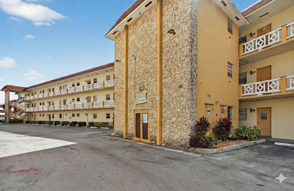 Photo of 5111 W Oakland Park Boulevard #105, Lauderdale Lakes, FL 33313 (MLS # R11161253)