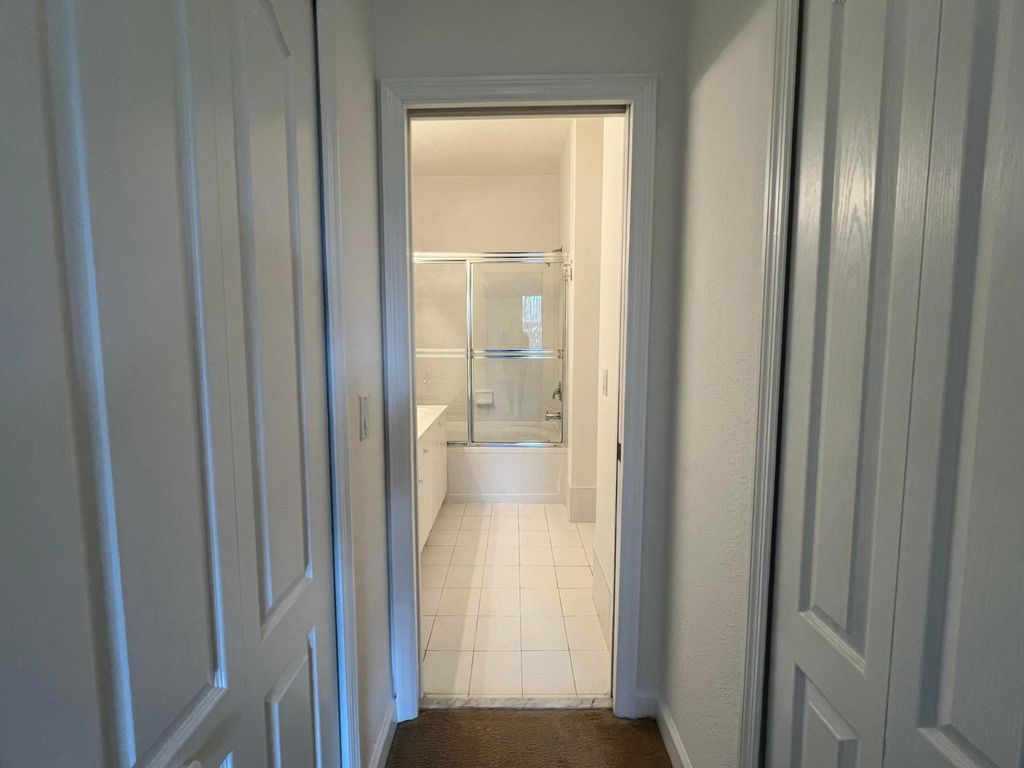 Photo of 150 Jacaranda Country Club Drive #102, Plantation, FL 33324 (MLS # B26000079)