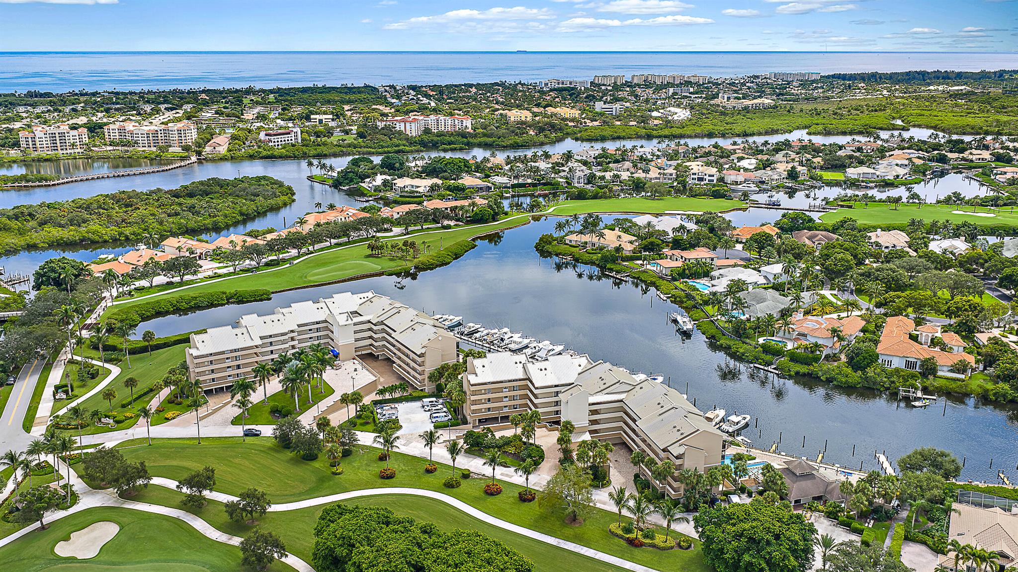 Beautifully updated waterfront condo in the gated community of Jonathan's Landing, this stunning 2-bedroom, 2-bath residence offers an open concept layout with a chef's kitchen, LG stainless steel appliances, and spacious breakfast bar. Large screened-in porch overlooks the marina with slips for residents (upon availability), golf course, and lagoon views. Anchorage residents enjoy covered parking, golf cart storage and guest parking situated within short distance of tennis, pickleball, fitness center and the golf course. Club membership is optional and includes 3 championship golf courses, Fitness, Dining, etc. All of this is just minutes to the Jupiter Inlet with no fixed bridges, ocean access, fine dining, shopping, and the beach, making it the perfect blend of luxury and lifestyle.