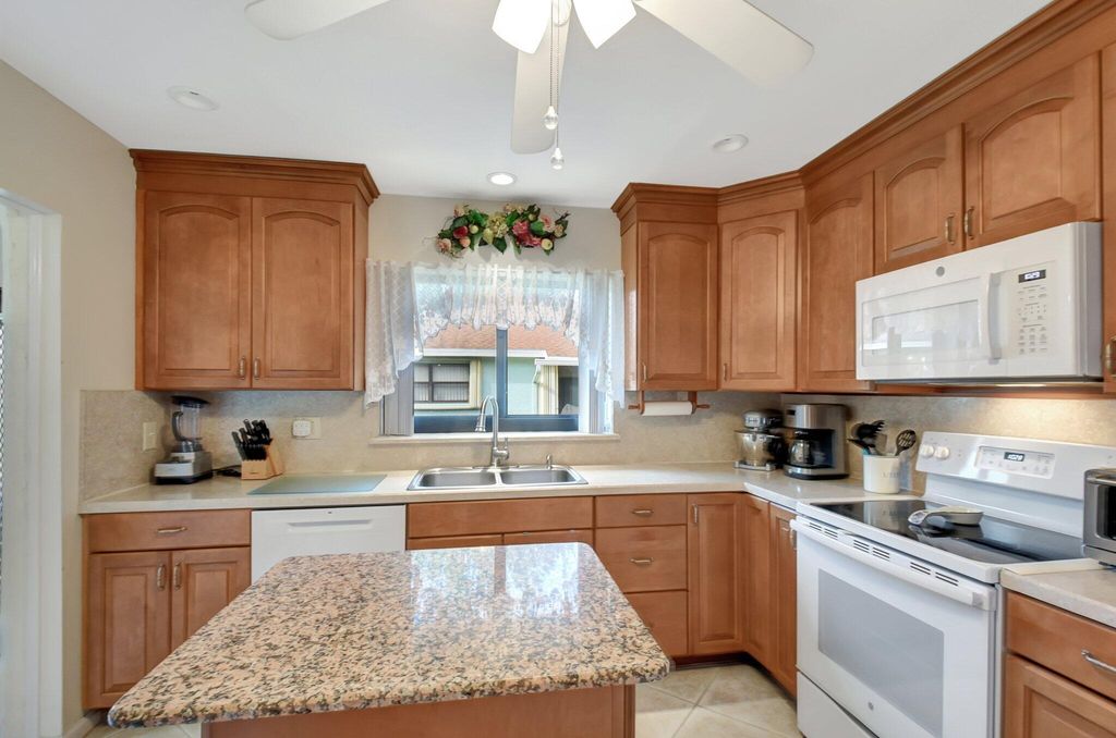 Photo of 9855 Loquat Tree Run A Run #A, Boynton Beach, FL 33436 (MLS # R11112759)