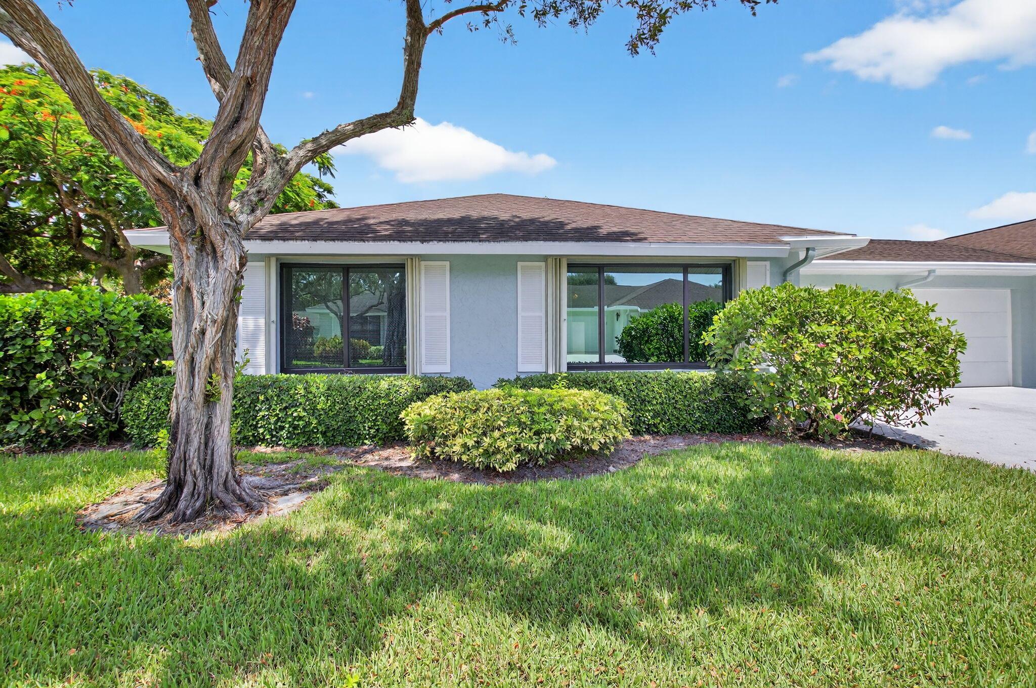 Discover this charming corner unit villa in Bent Tree East, featuring 2 bedrooms and 2 bathrooms. The open living and dining area is perfect for entertaining, parquet wood flooring throughout & filled with natural light. The spacious master bedroom offers ample closet space, providing a peaceful retreat. Extra square footage added by opening up the Florida room creating space for an office or dinette area. A/C (2023) with UV system. Association fees cover water, cable, lawn care, and exterior maintenance, allowing for a maintenance-free lifestyle. The active community boasts amenities such as a pool, bocce court, and billiards, perfect for socializing and recreation. This villa offers comfort, convenience, and a vibrant community makes it an ideal place to call home!