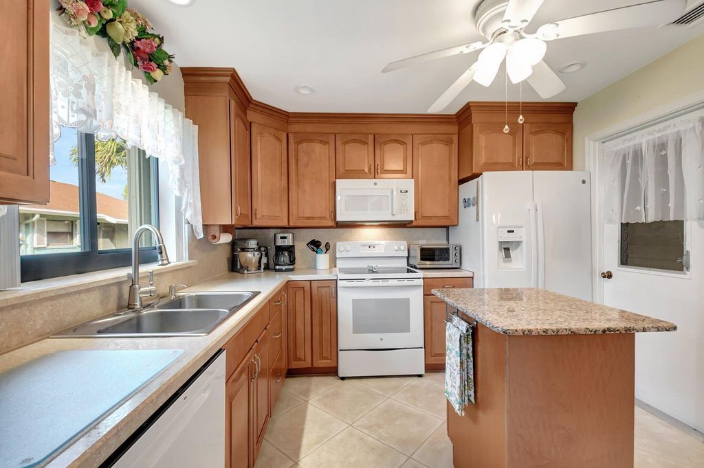 Photo of 9855 Loquat Tree Run A Run #A, Boynton Beach, FL 33436 (MLS # R11112759)