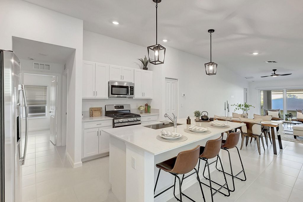 Photo of 6421 NW Leafmore Lane, Port Saint Lucie, FL 34987 (MLS # R10942730)