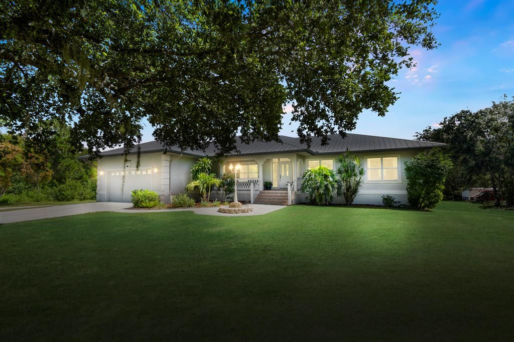 Photo of 7630 SW Parkway Drive, Stuart, FL 34997 (MLS # R10741426)