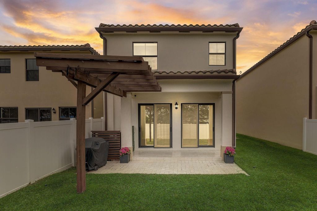 Photo of 5313 NW 50th Terrace, Tamarac, FL 33319 (MLS # F10424212)