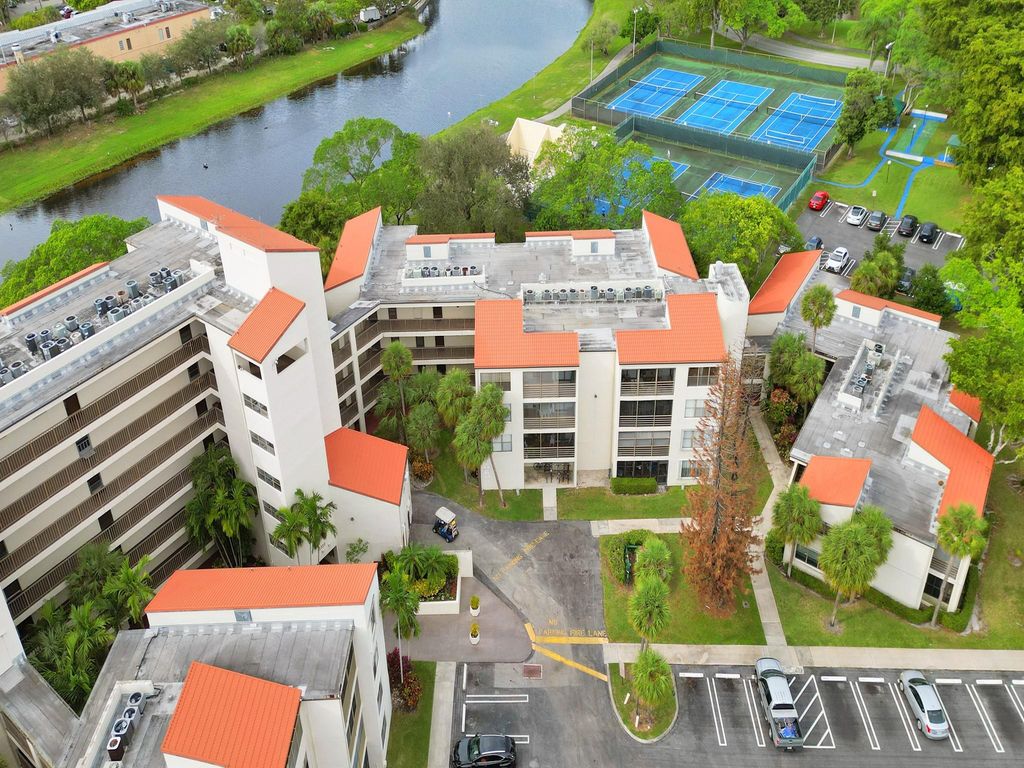 Photo of 2324 S Cypress Bend Drive #215, Pompano Beach, FL 33069 (MLS # F10413390)