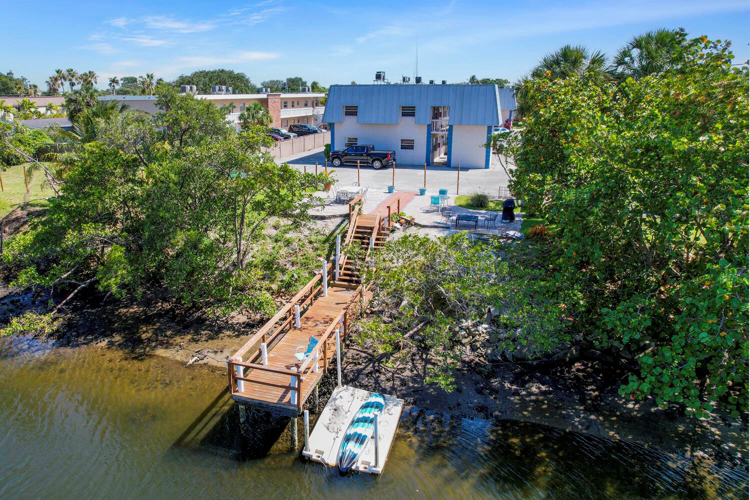 This spacious ground floor corner apartment is just steps to the Earman River. Create memories on the tranquil fishing pier, or just relax on the patio while grilling on the waterfront deck. Unit is fully equipped with Stainless kitchen appliances including dishwasher, W/D, TV, Central A/C & heat. Bedrooms include walk in closets & dressers. Excellent location blocks from Palm Beach's most desired shopping areas, as well as a few minutes to Singer Island's beaches, dining and natural areas.