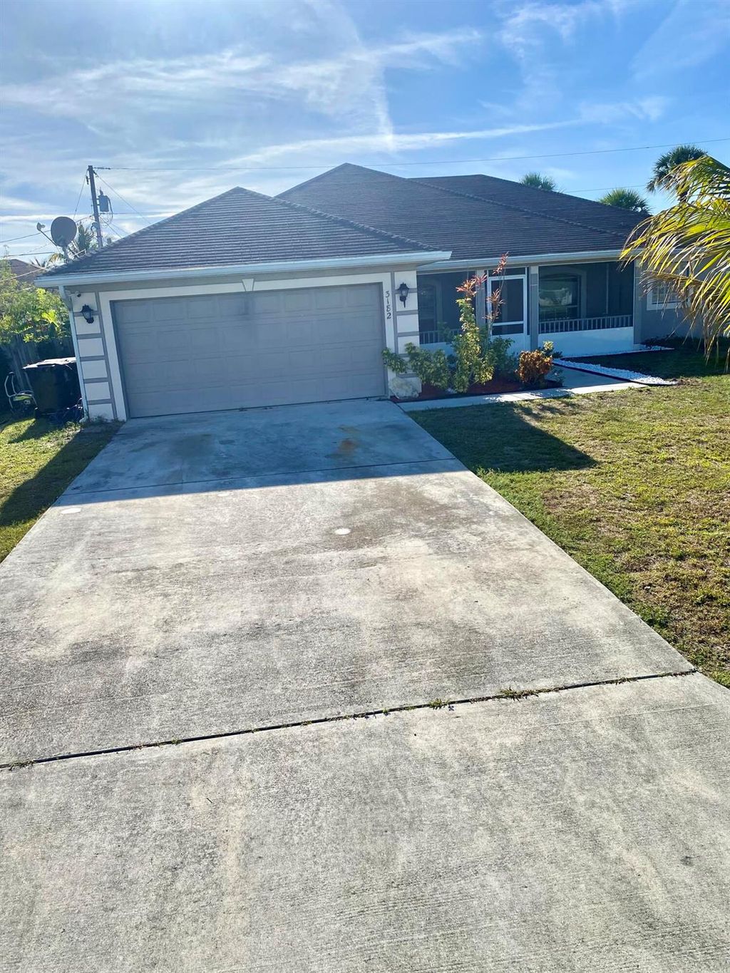 Photo of 3182 SW Curcuma St, Port Saint Lucie, FL 34953 (MLS # R10979635)