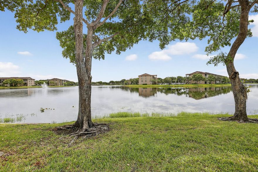 PRICE REDUCTION- MOTIVATED SELLER -LAkefront living -Newest section of Century Village, Pembroke Pines with this spacious ground-floor Karanda model. Featuring a smart layout with two walk-in closets, a galley kitchen with breakfast nook, and AC replaced in 2022, this well-maintained unit offers comfort and convenience with parking near the entrance. Residents enjoy resort-style amenities including pools, golf, tennis, pickleball, clubhouse events, and 24/7 security with courtesy transportation. Monthly fees include water, cable, and internet. Association requires a 650+ credit score, no rentals for the first 2 years, a max of 3 occupants (owner must reside), and a limit of 2 cars (1 per person). Assoc fee is $797/month - Located near excellent dining, shopping, and entertainment options.