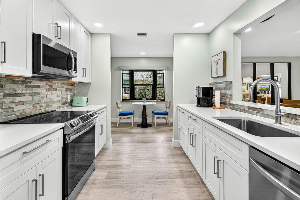 Photo of 8560 SE Eaglewood Way, Hobe Sound, FL 33455 (MLS # B26012244)