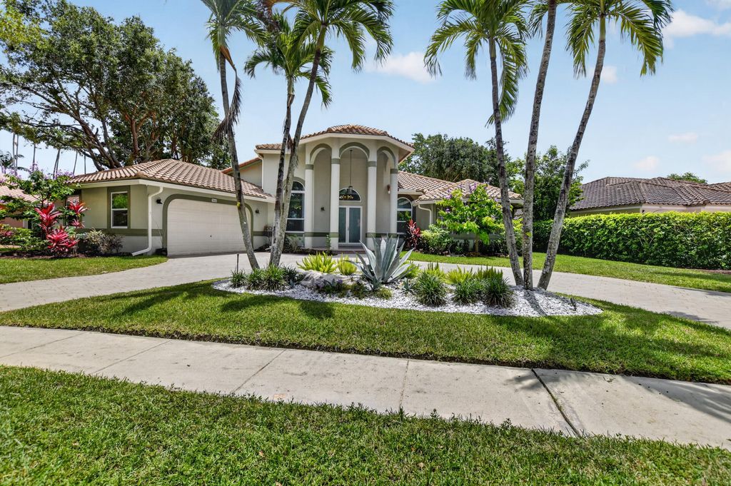 Photo of 7008 NW 66th Terrace, Parkland, FL 33067 (MLS # B26040854)