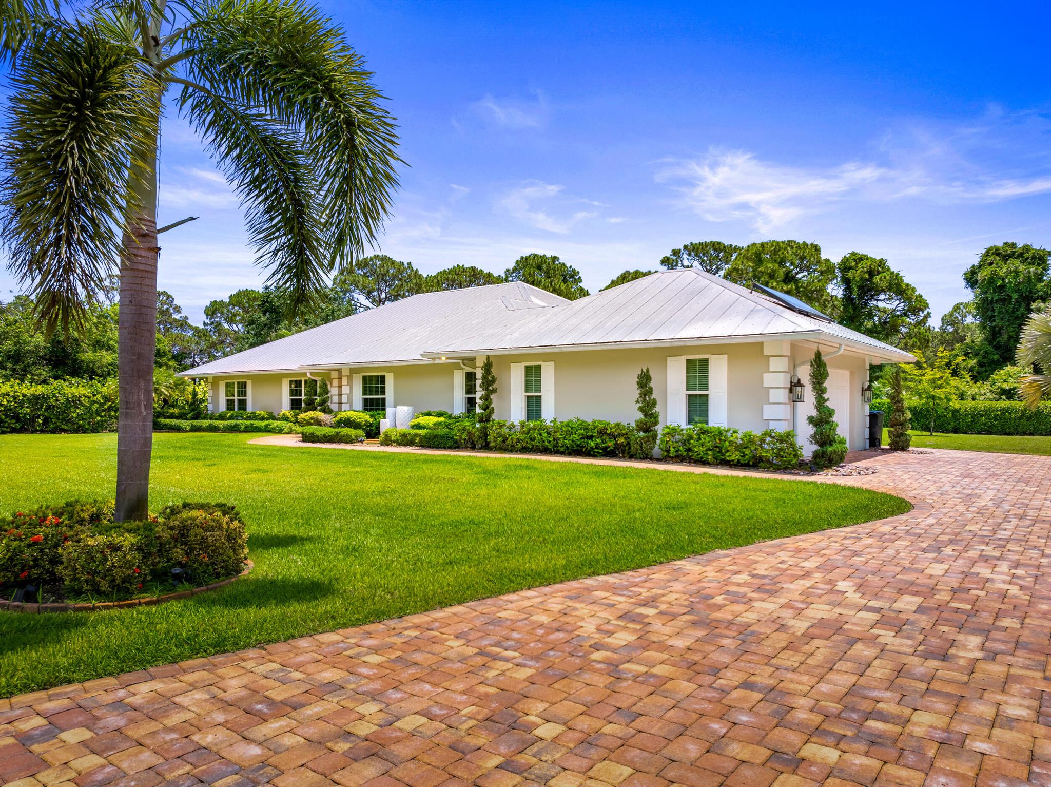 AMAZING!!!! PRICED TO SELL IN PGA VILLAGE, Luxury 4-Bedroom Pool Home on .83 Acres in Reserve Plantation at PGA Village...Welcome to your dream home in Reserve Plantation, one of the most desirable neighborhoods within the prestigious PGA Village golf community. This beautifully maintained 4-bedroom, 3-bathroom residence sits on a spacious .83-acre lot and blends refined elegance with everyday comfort, offering an exceptional lifestyle both indoors and out.