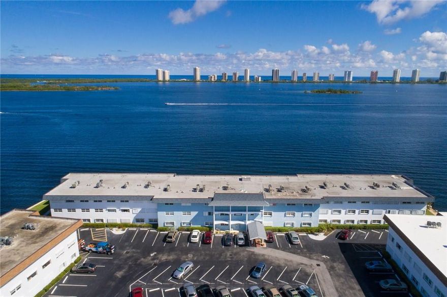 THIS CONDO IS DIRECTLY ON THE INTERCOASTAL*FABULOUS VIEWS OF THE INTERCOASTAL AND SINGER ISLAND FROM YOUR PATIO. SPACIOUS WATERFRONT CONDO OFFERS A LARGE LIVING ROOM* L SHAPED DINING AREA OFF KITCHEN*2 MASTER-SIZED BEDROOMS*WALK-IN CLOSET*2 FULL BATHS*LAMINATE AND CARPET FLOORING*SCREENED PATIO*ACCORDIAN SHUTTERS*CLUB HOUSE*HEATED SALT WATER POOL*EXERCISE AREA*PRIVATE FISHING PIER*GREAT LOCATION TO SHOPPING AND RESTURANTS*