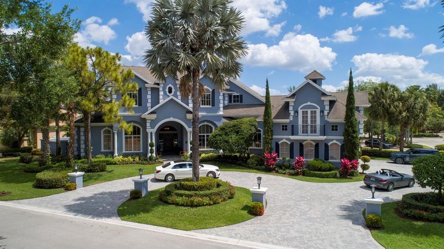 Exceeding all of your expectations! This incredibly magnificent estate home was completely renovated in 2018, with no expense spared! The home boasts a huge family room, gourmet kitchen with island, top-of-the-line appliances, 2 dishwashers, 180 gallon salt water fish tank, new wine cellar that holds over 400 bottles, spectacular owner suite with a separate sitting area and amazing bath and closets galore, private jacuzzi spa, custom built-in office, fitness room, guest room with en suite, rear staircase leads to the children's playroom or large bonus room, all bedrooms and bathrooms have beautiful finishes, there is a mudroom, laundry room, custom outdoor kitchen, resort style heated swimming pool w/hot tub, putting green, basketball court, and more! Don't miss the virtual tour!