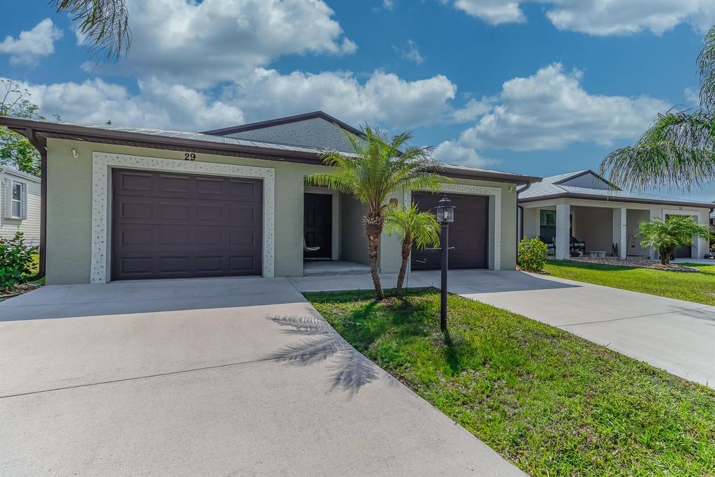 Photo of 29 Mediterranean Boulevard W, Port Saint Lucie, FL 34952 (MLS # R11094590)