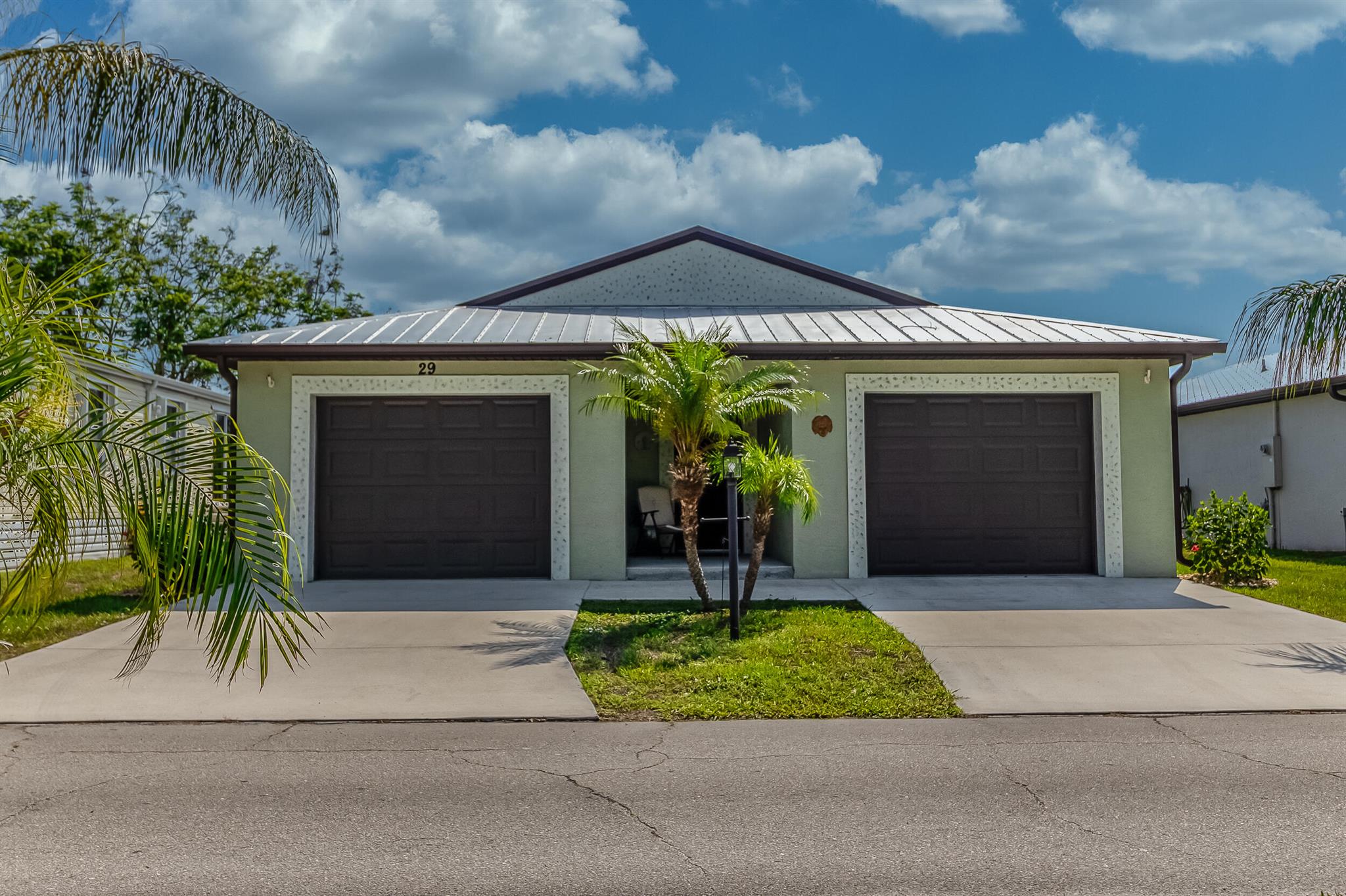 Beautifully Maintained 2-bed, 2-bath home in the welcoming 55+ community of Spanish Lakes One. Enjoy a spacious open floor plan filled with natural light, a bright kitchen with ample storage, and a large primary suite with walk-in closet and private bath. Monthly land lease includes lawn care, trash, and access to top-tier amenities: two heated pools, clubhouse with bar, kitchen, stage auditorium, library, gym, sauna, woodworking shop, arts & crafts, card room, and billiards. Outdoor features include a 9-hole golf course, tennis, pickleball, bocce, shuffleboard, softball, and horseshoes. Close to beaches, shopping, and healthcare. Ideal for retirement or seasonal living, come and see it today.
