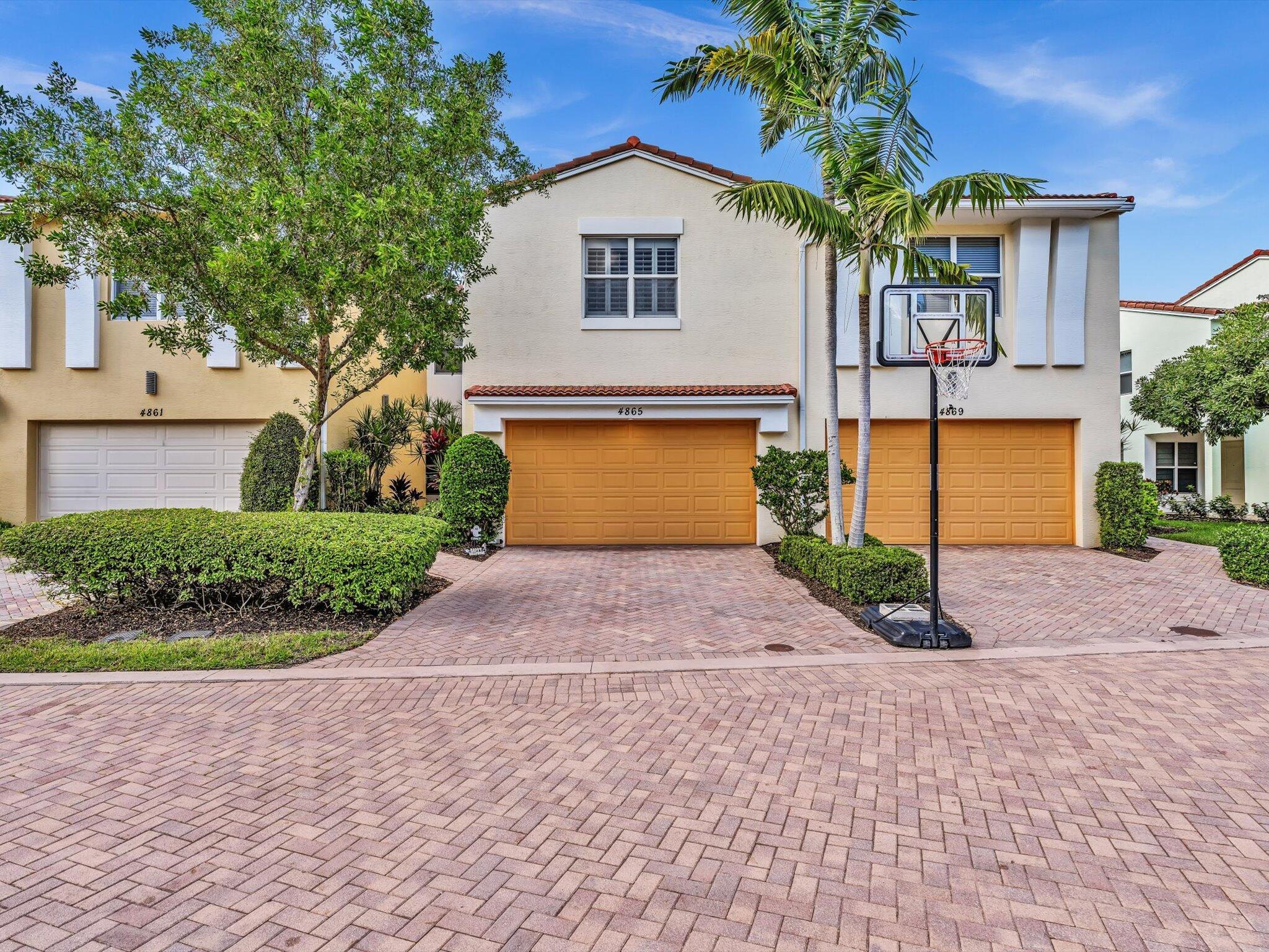 Centra Boca Raton turnkey townhome with sweeping views of the Pond Hawk Natural Area boasts 3 bedrooms, a loft area, two full bathrooms, and powder room with attached two car garage. Two outdoor spaces to enjoy the unobstructed views of the preserve. The main level is an open concept full kitchen, dining and living room area with powder room and patio. The second floor contains an en suite primary bedroom with balcony, two guest bedrooms and a second full bath,  laundry room and loft lounge area. The owner has made many upgrades: New AC Sept 2025, LVP flooring, Carpet stairs Paint - downstairs living room, dining room, kitchen, second bedroomDishwasher,  Washer, Dryer andnew Electronic Window Treatments.Close to school, library, restaurants, shops, 95 and beach.
