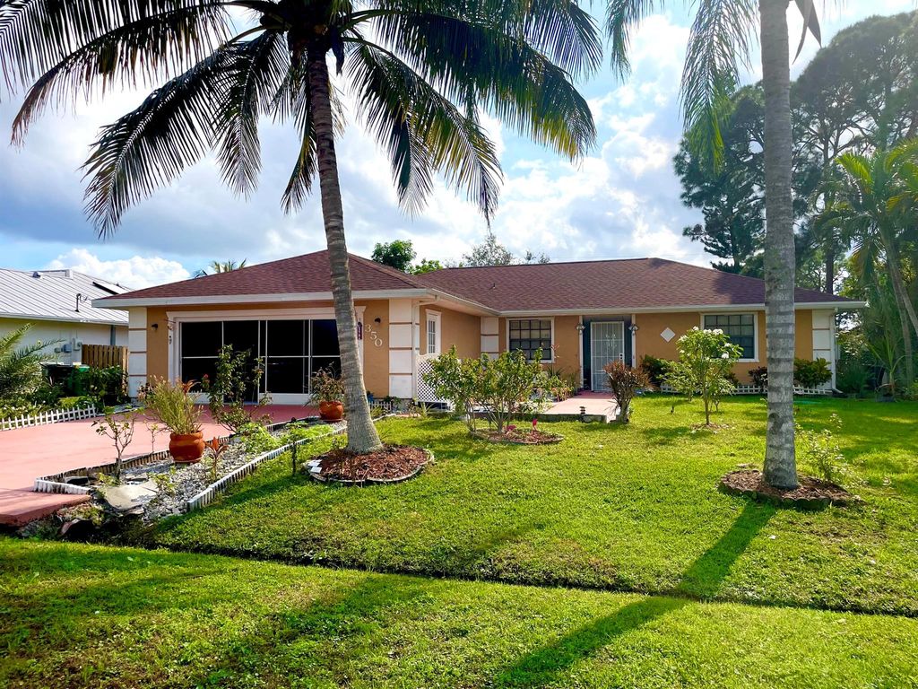 Photo of 350 SE Husted Terrace, Port Saint Lucie, FL 34983 (MLS # R10945777)