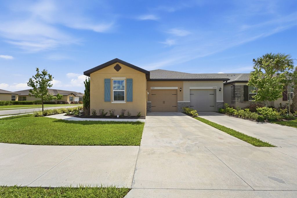 Photo of 1802 Celebration Drive, Fort Pierce, FL 34947 (MLS # B26022468)