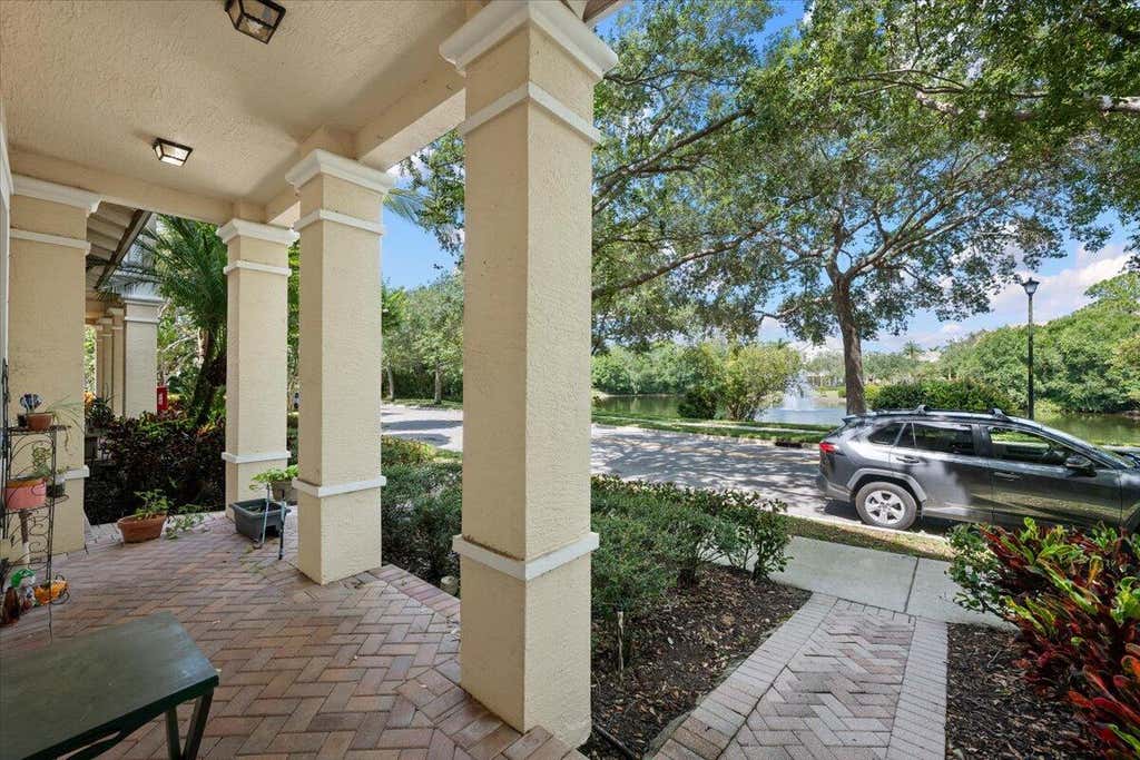 Photo of 335 E Thatch Palm Circle #104, Jupiter, FL 33458 (MLS # B26063332)