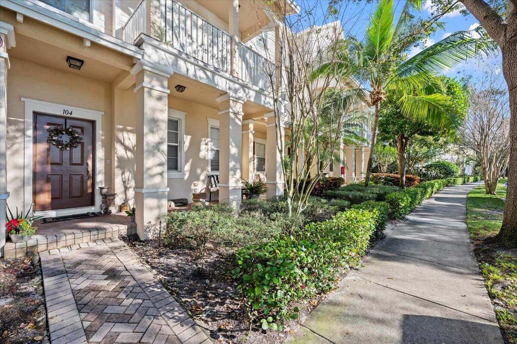 Photo of 335 E Thatch Palm Circle #104, Jupiter, FL 33458 (MLS # B26063332)