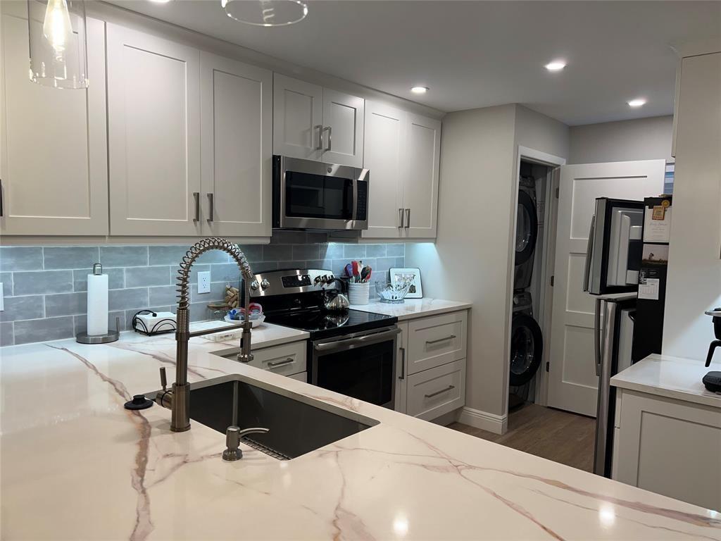 Come stay for the winter in this updated condo. Beautiful water views, all the comforts of home and less than a mile to the beach. Full size front load washer and dryer in the kitchen, covered parking for your car, and everything you need for a relaxing winter stay. Hillsboro Cove is an active 55+ waterfront community with amenities. Close to restaurants, shopping and more.