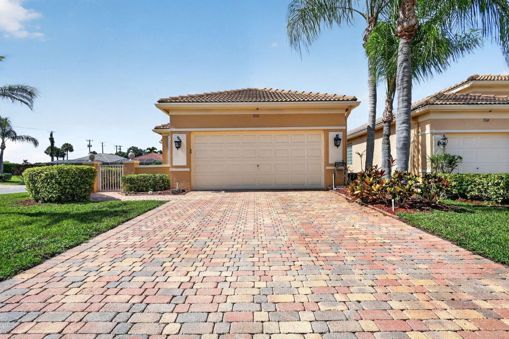 Photo of 7116 Cataluna Circle, Delray Beach, FL 33446 (MLS # B26028878)