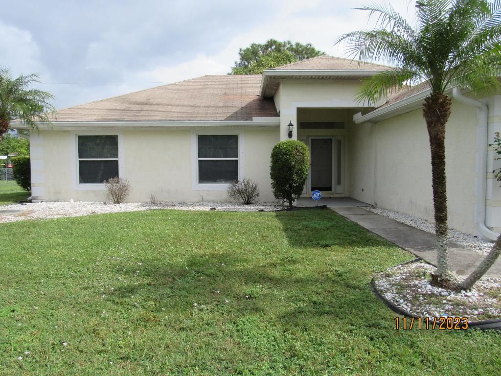 Photo of 3821 SW Janiga Street, Port Saint Lucie, FL 34953 (MLS # R10935669)